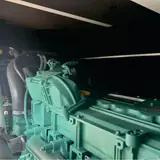 Volvo TAD750GE engine and air intake inside the 112 kW generator enclosure