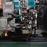 20 kW Perkins generator set without its enclosure, alternator and engine on the steel base frame