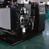 Radiator end of the open-frame 20 kW Perkins generator set with its control panel