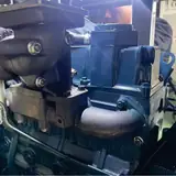 Kubota V3600 engine turbocharger and intake inside the 40 kW generator