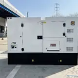 50 kW Cummins natural gas generator in a white silent-type enclosure, front view