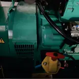 Alternator and yellow battery isolator switch on the 50 kW Cummins gas generator