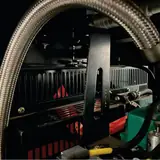Braided flexible hose and radiator inside the 50 kW gas generator enclosure