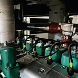 Exhaust riser and gas intake assembly on the 50 kW Cummins gas engine