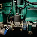 Gas shut-off solenoid valve and fittings on the 50 kW gas generator